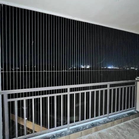 Invisible grill installed on a balcony railing in Hyderabad